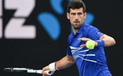 Djokovic avança no Australian Open após desistência de Nishikori e desafia Pouille na semi
